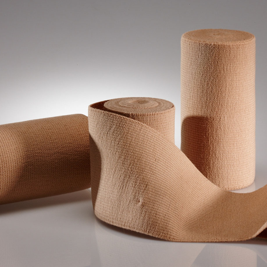 ELASTUS long/elast Langzugbinde 7 m x 10 cm, hautfarben, fein  (8 Stck.)